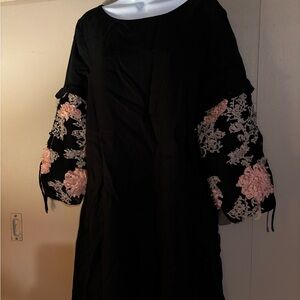Elegant Black Dress with Floral Sleeves